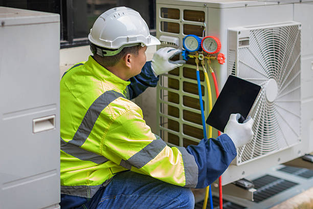 Professional Ductwork Repair technician working in Bay City, TX